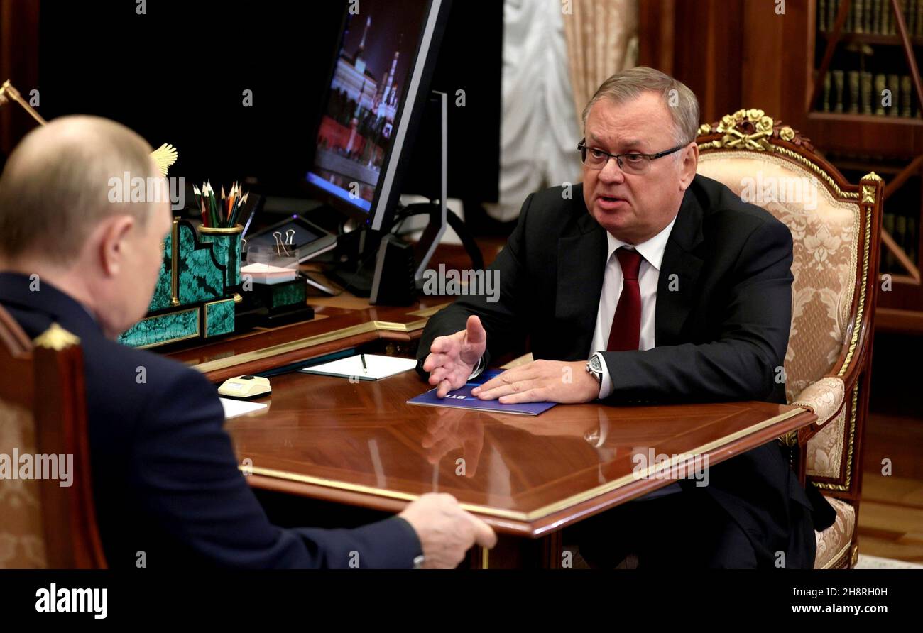 Moscow, Russia. 30 November, 2021. Russian President Vladimir Putin, left, holds a face-to-face meeting with the Chairman of VTB Bank Management Board Andrei Kostin in the Kremlin, November 29, 2021 in Moscow, Russia.  Credit: Mikhail Klimentyev/Kremlin Pool/Alamy Live News Stock Photo