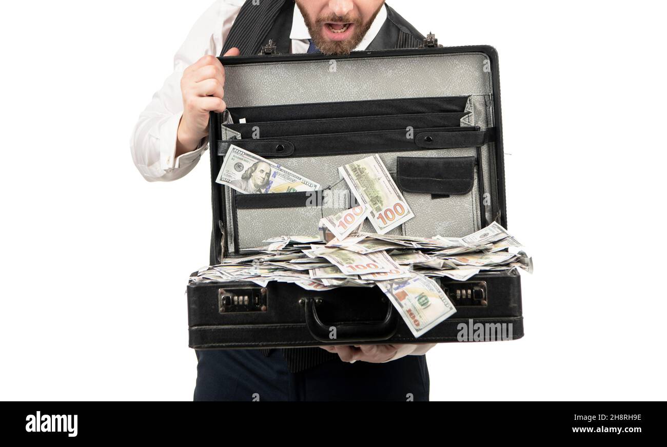 cropped millionaire holding case full of dollar cash isolated on white background, success Stock Photo