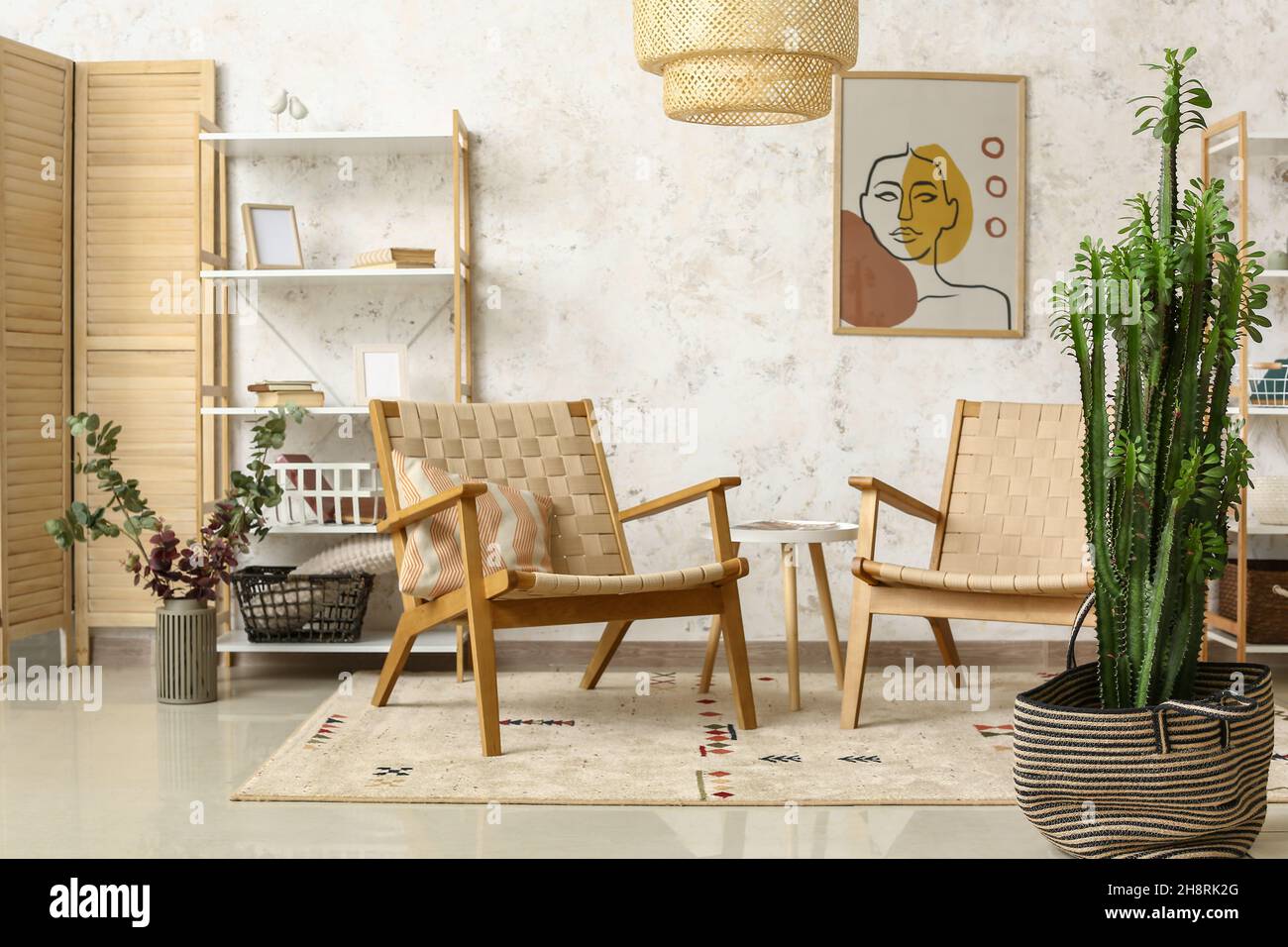 Interior of stylish living room with cactus Stock Photo - Alamy