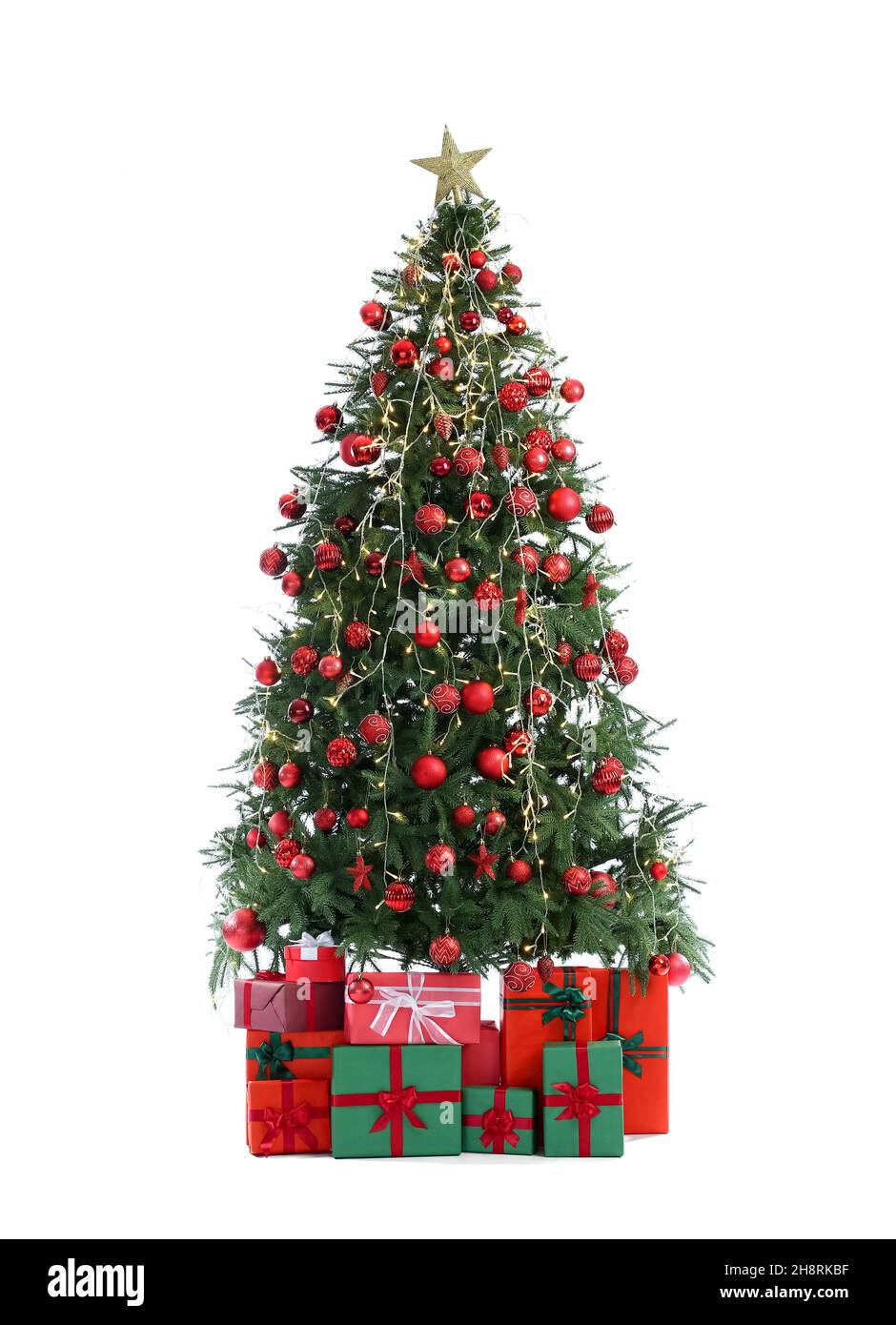 Beautiful decorated Christmas tree with gift boxes isolated on white ...