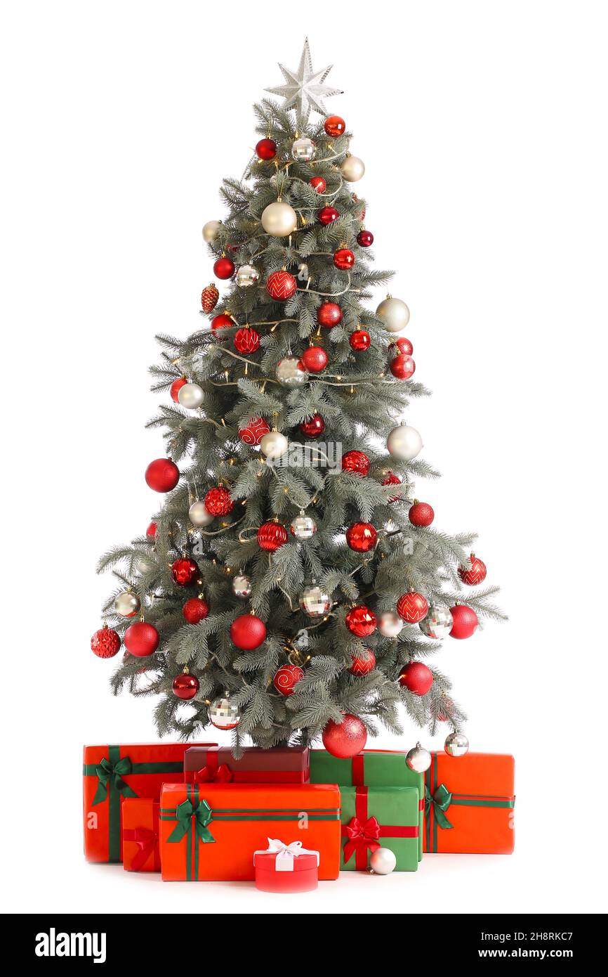 Beautiful decorated Christmas tree with gift boxes isolated on white ...