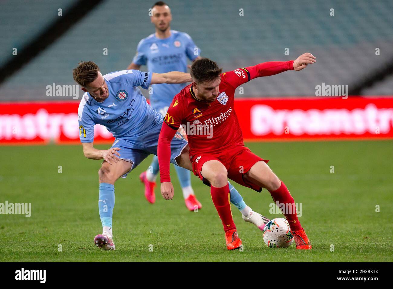 Melbourne City forward Craig Noone (11) and Adelaide United defender ...