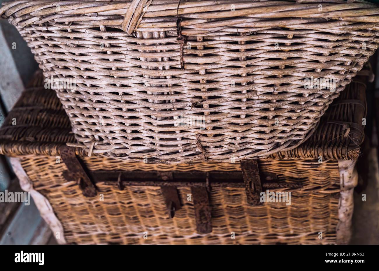Vintage cane baskets in closeup showing all the markings of age grain