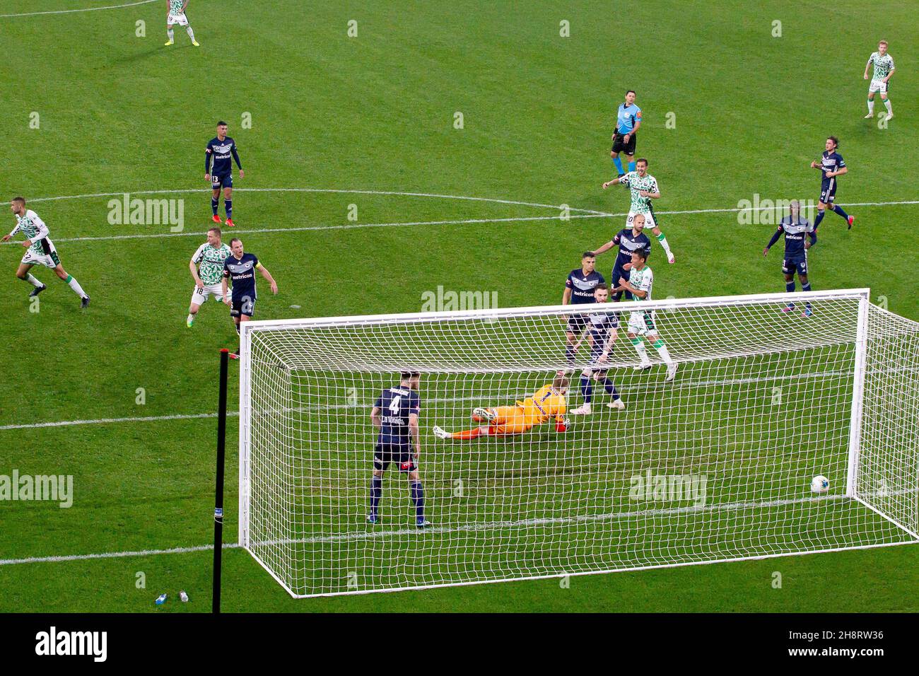 Melbourne Victory goalkeeper Matthew Acton (1) dives but can't stop ...