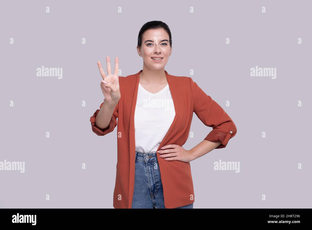 Girl showing three fingers hi-res stock photography and images - Alamy