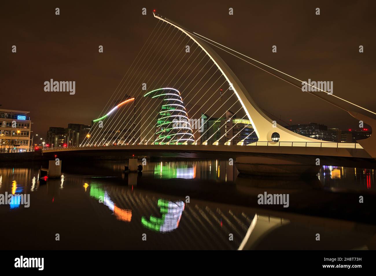 Dublin, Ireland - November 13, 2021: Beautiful wide angle evening view of Samuel Beckett Bridge and The Convention Centre Dublin with ring beam lights Stock Photo