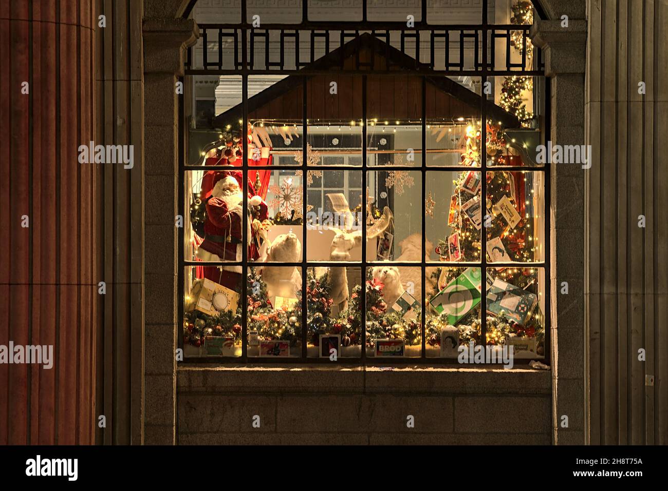 Dublin, Ireland - November 13, 2021: Beautiful evening view of Christmas decorations on windows of An Post, General Post Office on O'Connell Street Stock Photo