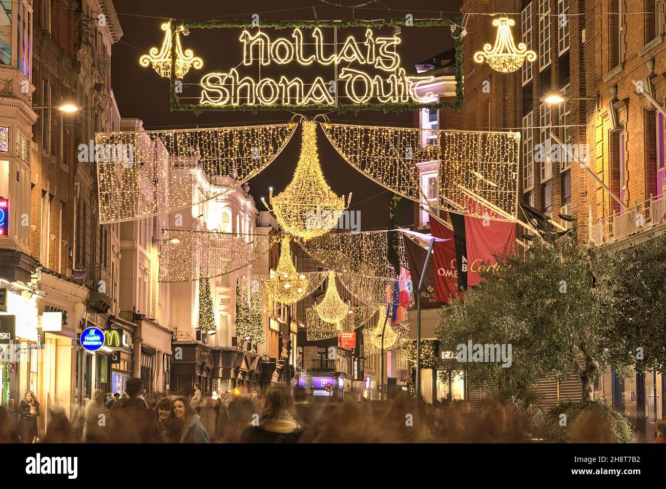 Dublin, Ireland - November 13. 2021: Nollaig shona dhuit Christmas lights. Merry Christmas signboard written in Irish (Gaelic) language Stock Photo