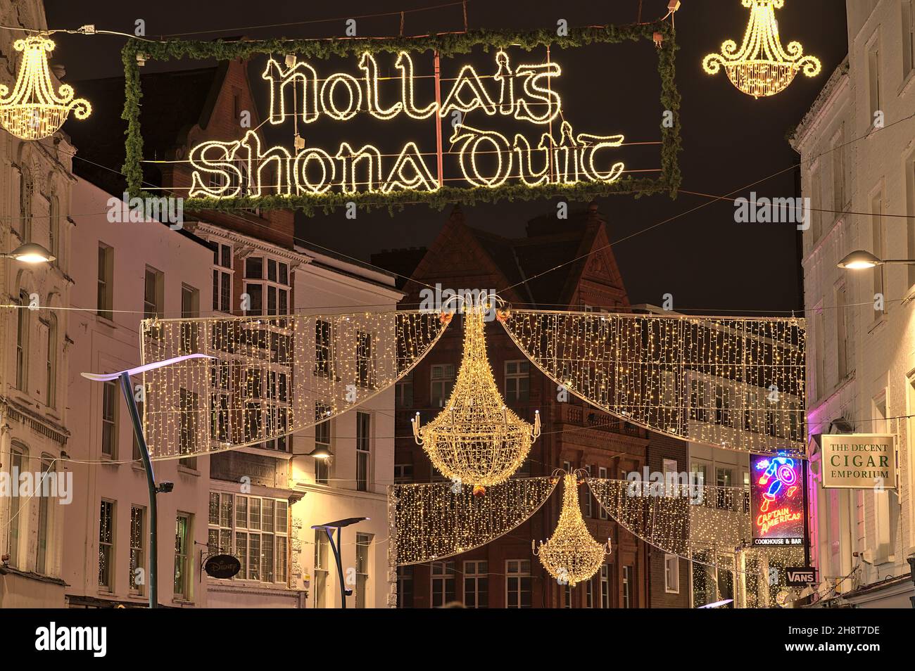Dublin, Ireland - November 13. 2021: Evening view of Nollaig shona dhuit Christmas lights. Merry Christmas signboard written in Irish language Stock Photo