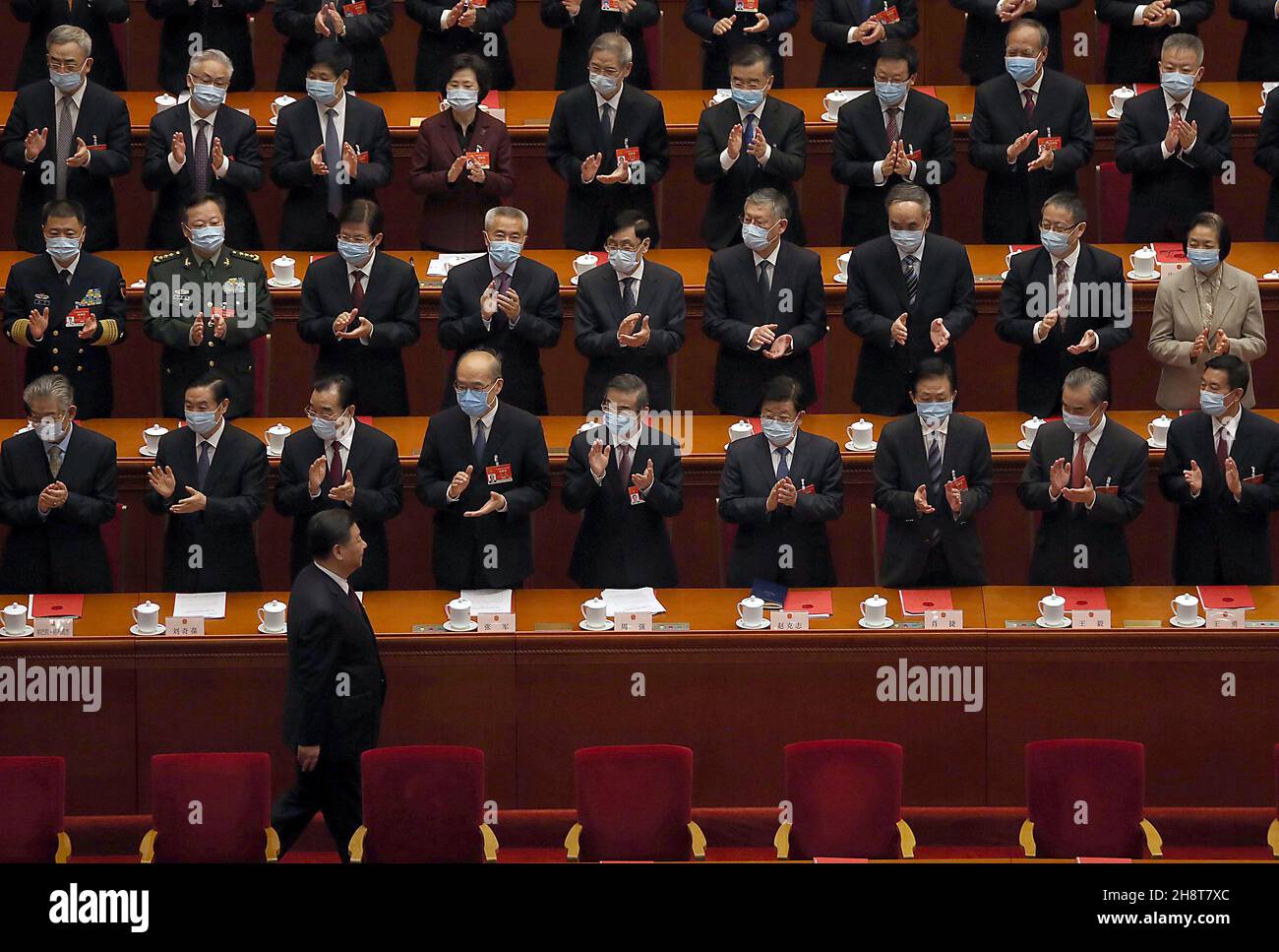 Beijing, China. 02nd Dec, 2021. Chinese President Xi Jinping is applauded as he arrives for the closing of the Fourth Session of the 13th National People's Congress (NPC) held in the Great Hall of the People In Beijing on Thursday, March 11, 2021. China approved a draft decision to overhaul Hong Kong's electoral system, its latest move to tighten control over the city, passing the 'patriots governing Hong Kong' resolution at the NPC. Photo by Stephen Shaver/UPI Credit: UPI/Alamy Live News Stock Photo