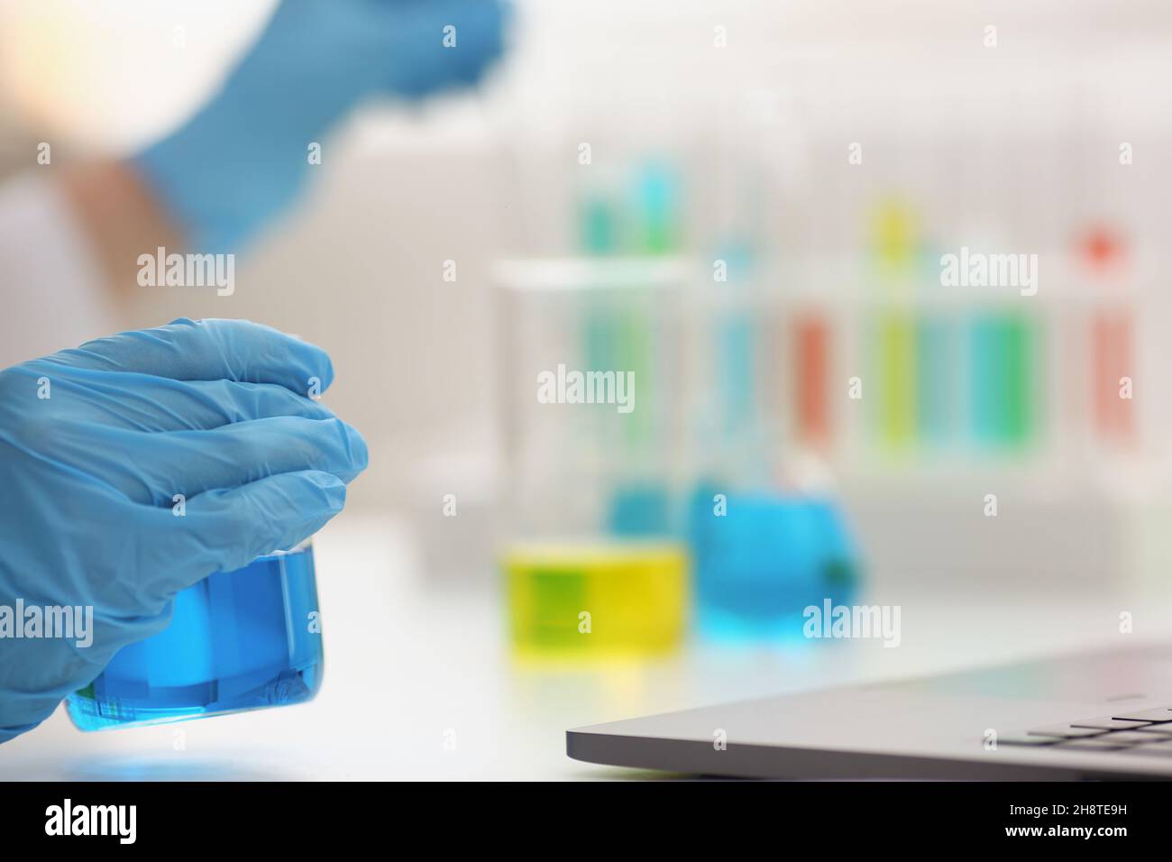 Close up microbiologist hands in hi-res stock photography and images ...
