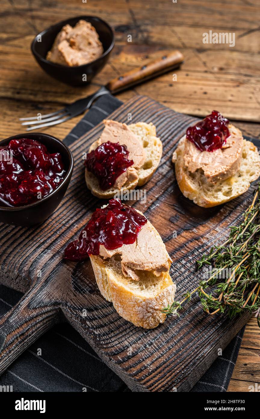French cuisine Foie gras toasts, goose liver pate and lingonberry