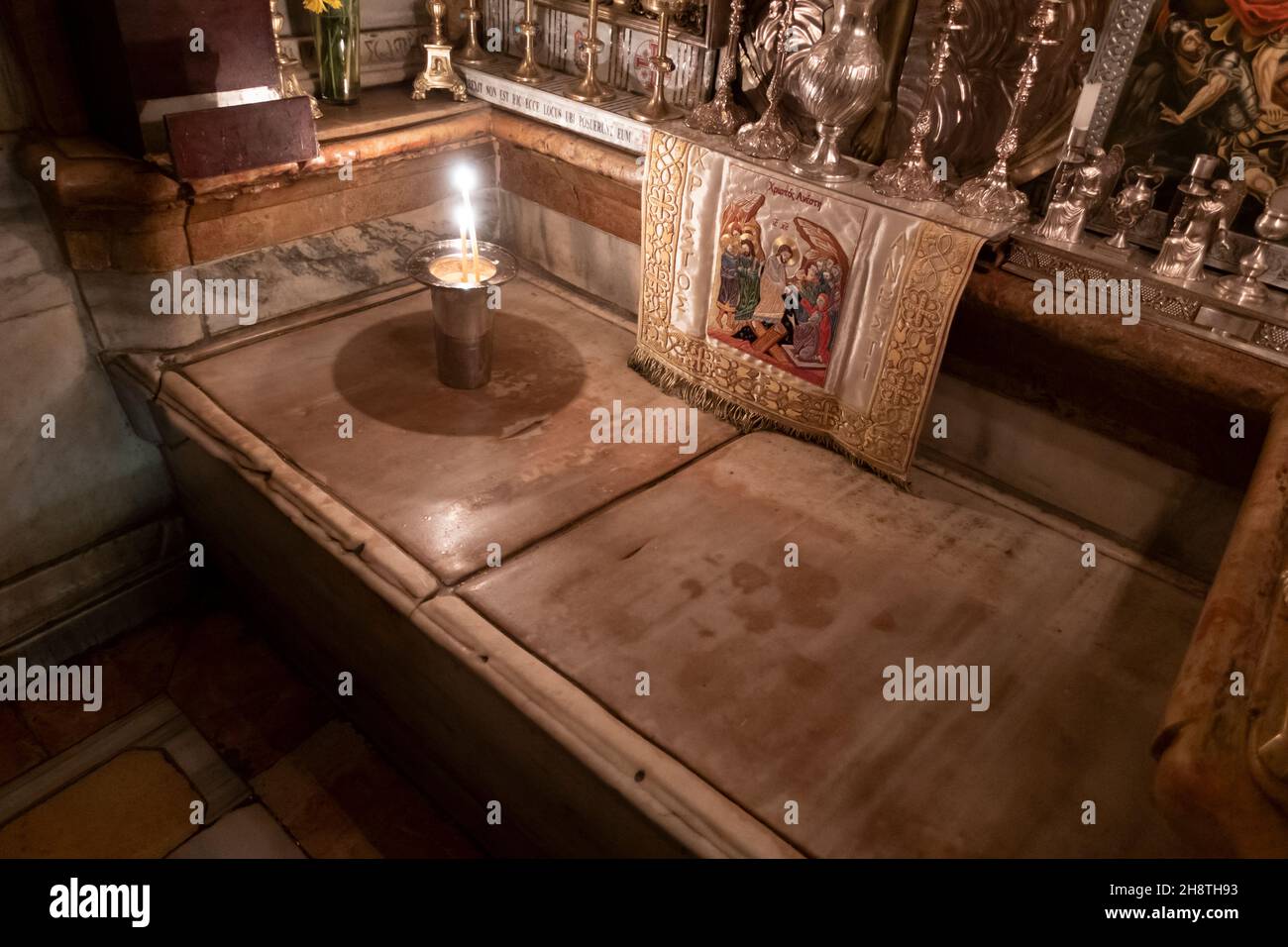 Candles lit over the Aedicule the14th Station of the cross housing the