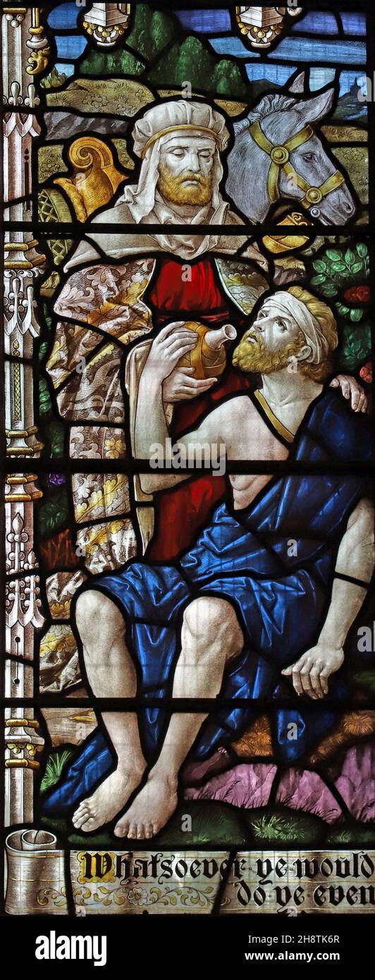 A stained glass window by Robert Newbery depicting The Good Samaritan