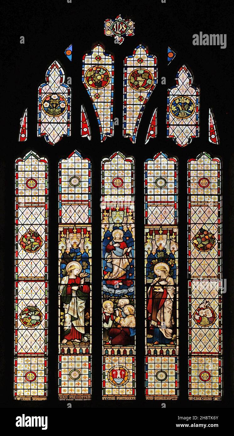 A stained glass window by Joseph Bell & Son depicting The Ascension of