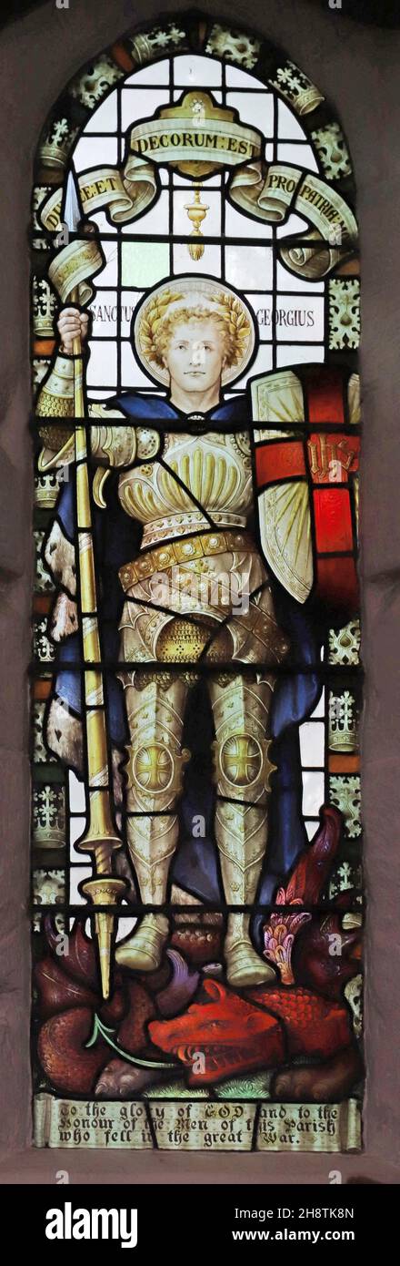 Stained glass window of 1921 by Percy Bacon depicting St George, St James Church, Shere, Surrey. Dedicated to the fallen of the parish Stock Photo