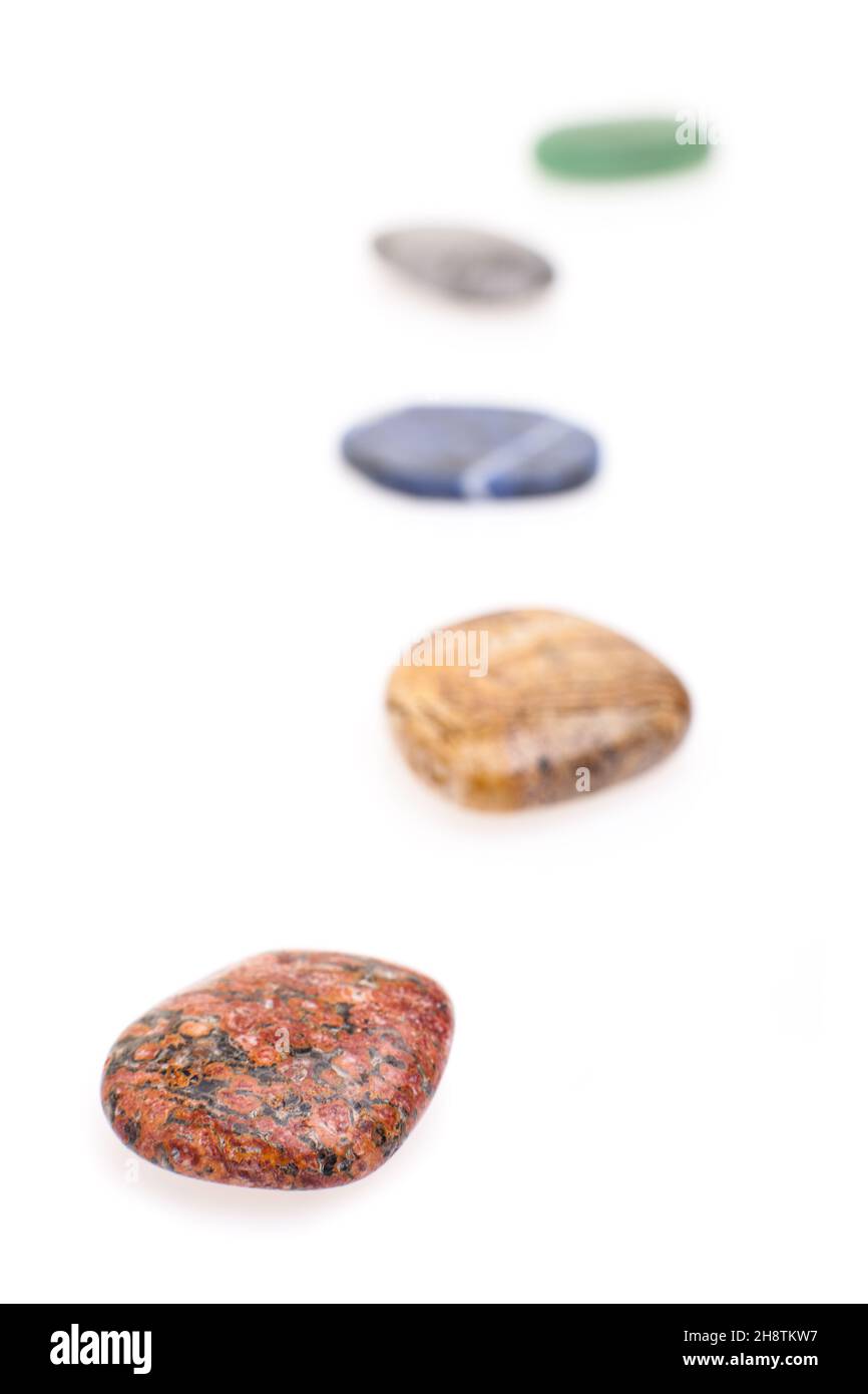 Curve of stones isolated on white background Stock Photo