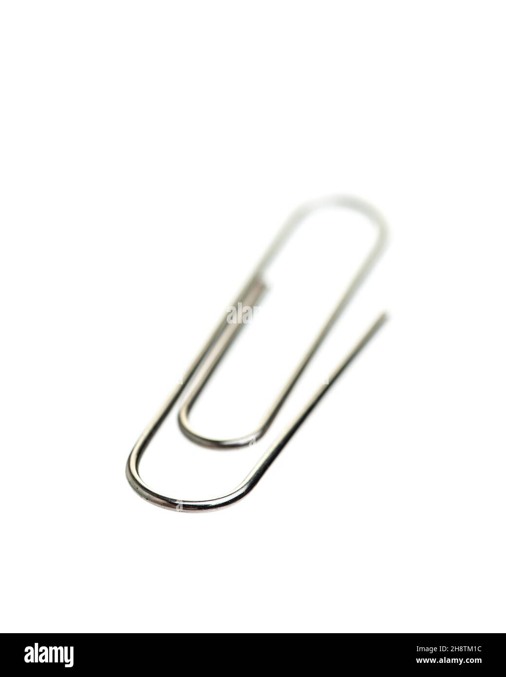 Paper clip isolated on white background Stock Photo