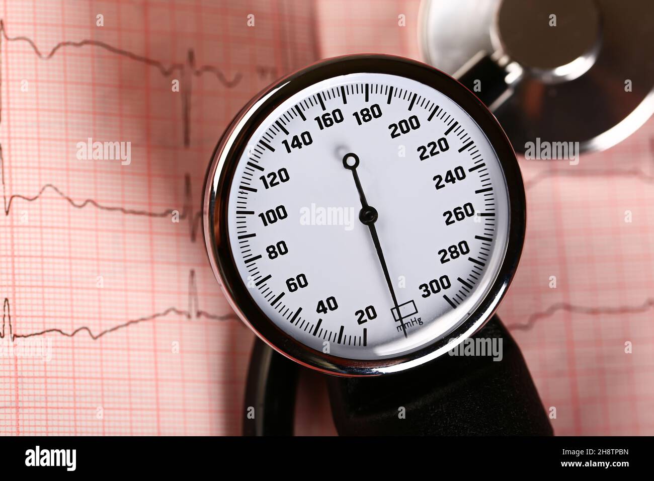 tonometer to measure the pressure and ECG on a pink background Stock ...