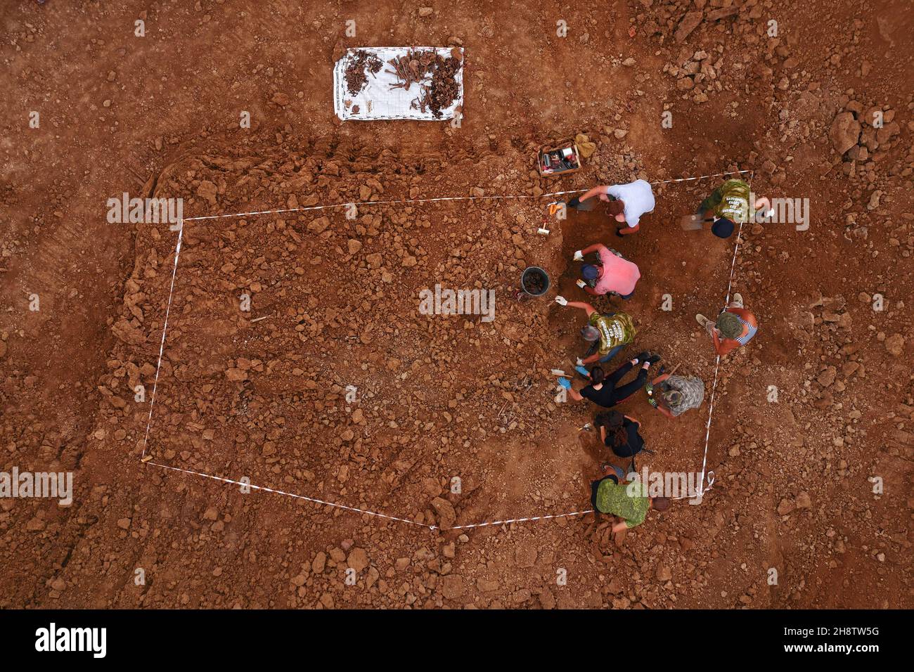 Excavations at the site of a war crime. Site of a mass shooting of ...
