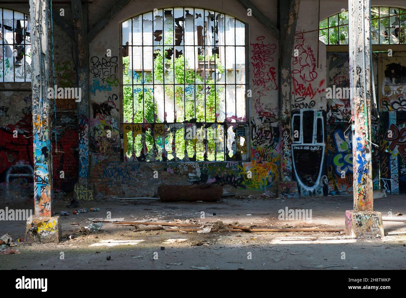 Berlin, Germany. Urban & Street Art inside an old and abandoned building of RAW Gelande, a former East-German / DDR / GDR abandoned Railway & Railroad maintenance factory. Stock Photo