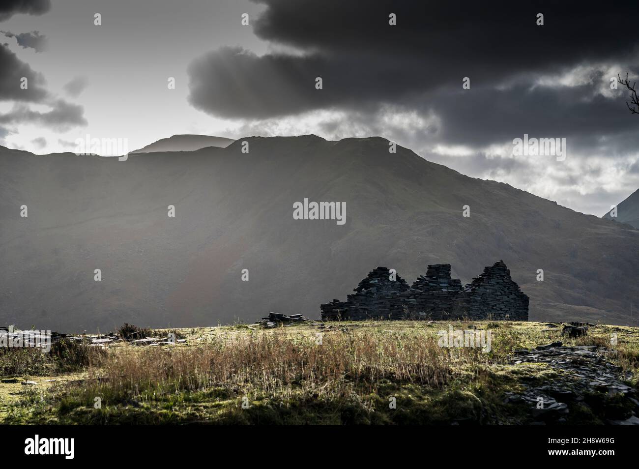These are what used to be the miners cottages at the abandoned Dinorwic slate quarry located above the Welsh village of Llanberis in North Wales Stock Photo