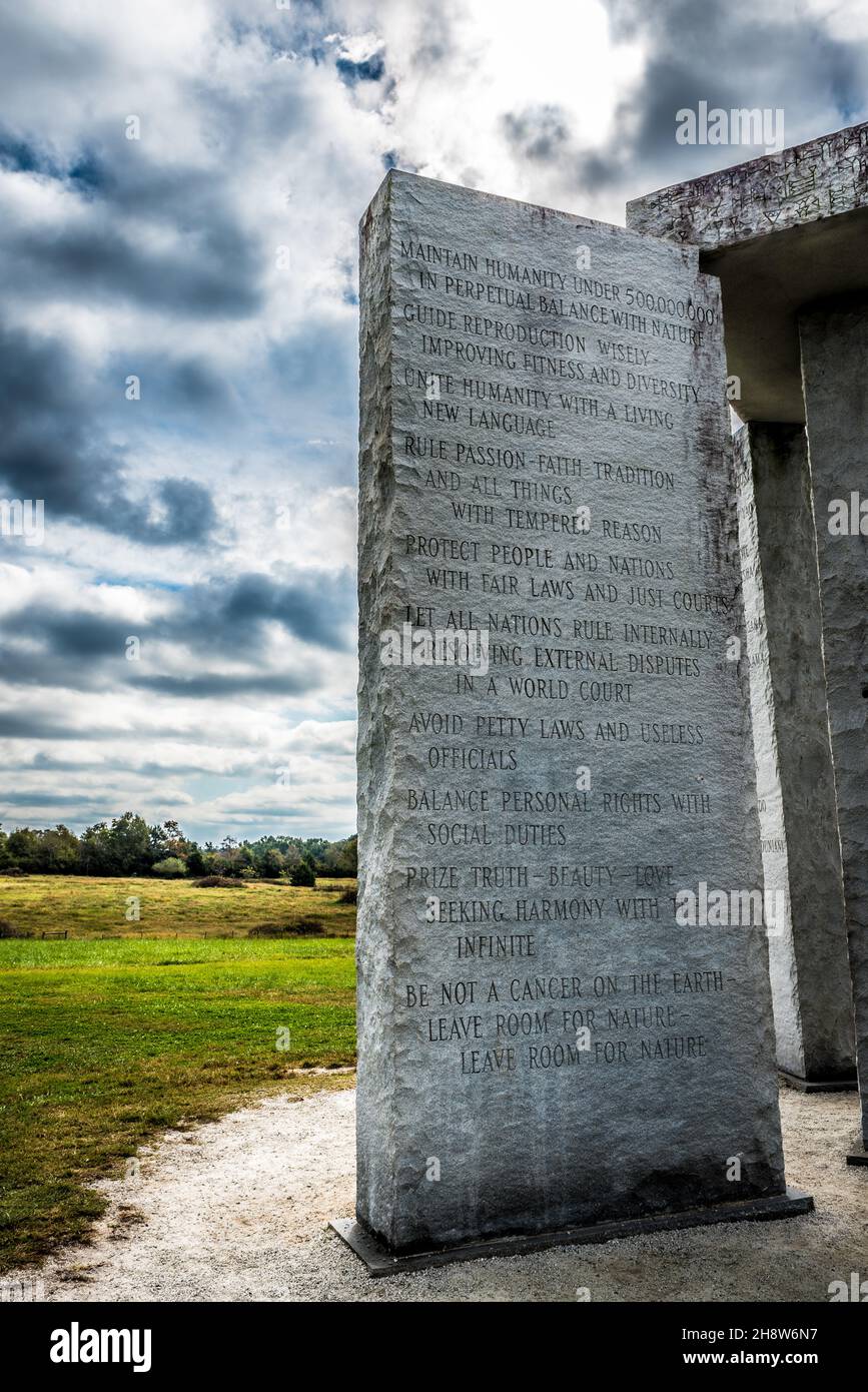 ELBERTON, UNITED STATES - Oct 25, 2021: A vertical shot of a stone slab at the Georgia Guidestones in Elberton with English and cuneiform inscriptions Stock Photo