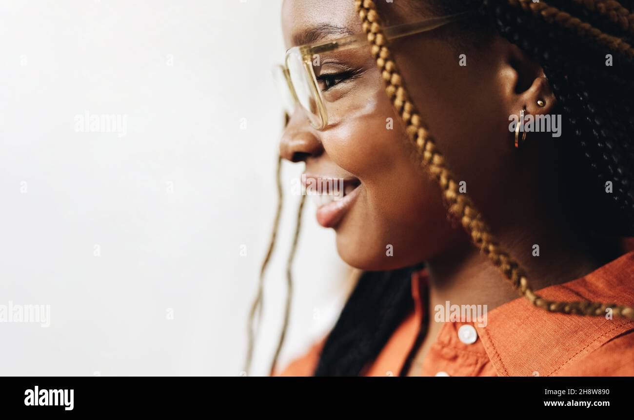Woman wearing glasses braids hi-res stock photography and images - Alamy