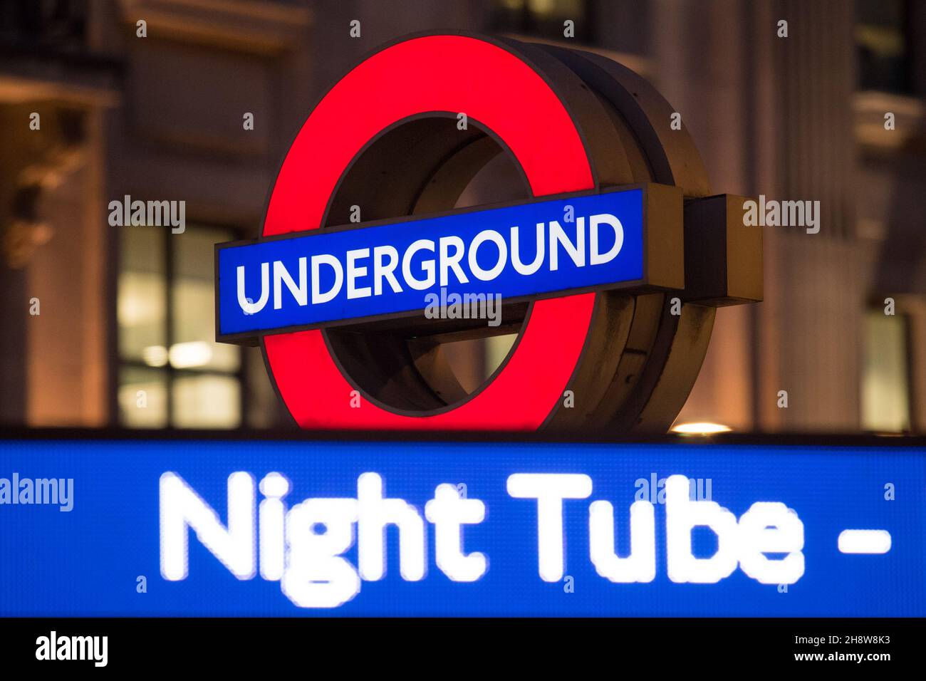 File photo dated 17/08/16 of a London Underground roundel alongside an advert for the night tube at Oxford Circus underground station. Travellers in London have been warned of "severe disruption" to the Night Tube this weekend as drivers stage a second round of strikes in a row over rosters. Issue date: Thursday December 2, 2021. Stock Photo