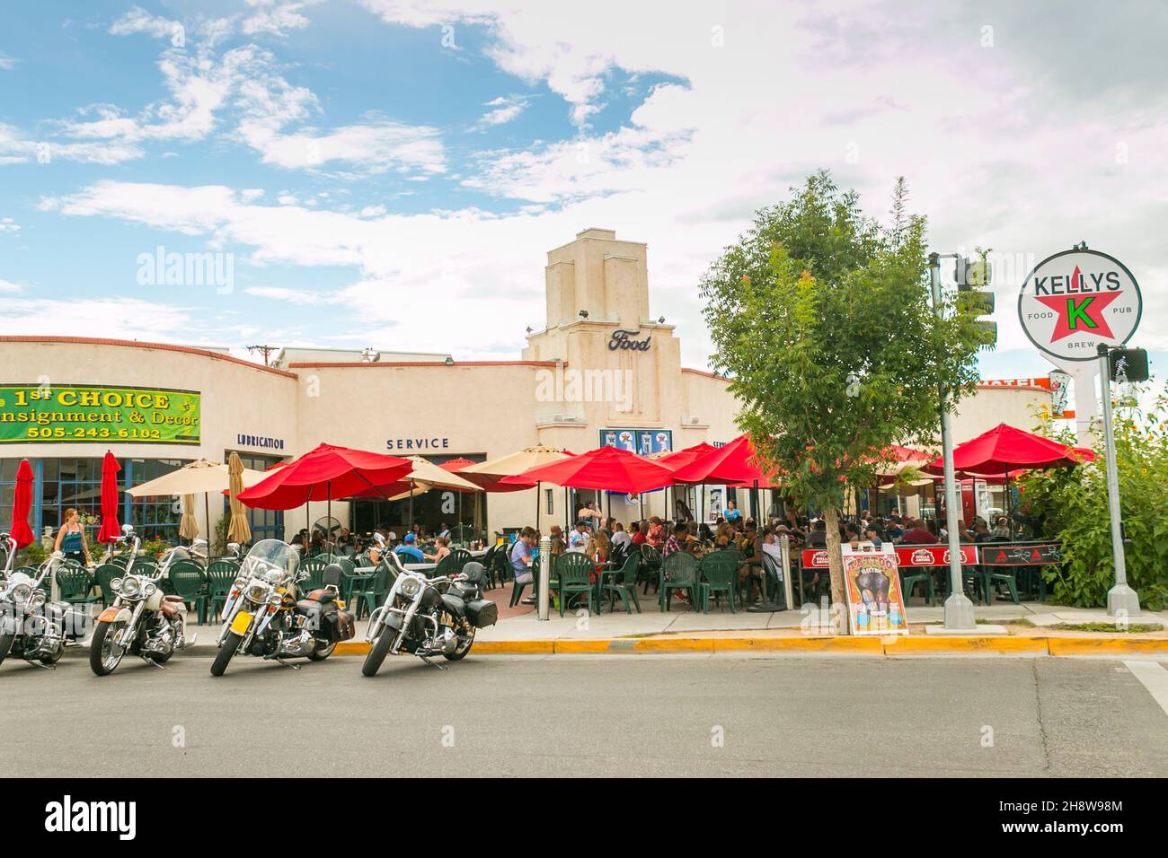 motorcycles parked outside cafe in a former Art Deco Food dealership