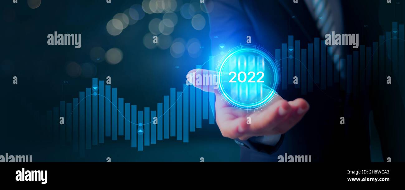 Trends of online businesses in 2022, hand holding graph of digital