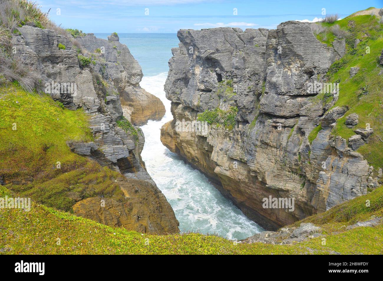 Pancake rocks in Punakaiki, New Zealand. The Pancake Rocks at Dolomite ...