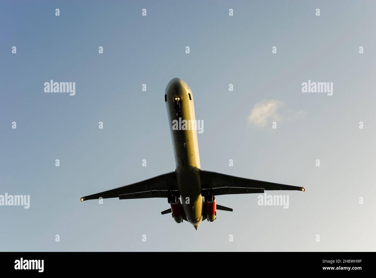 SAS Scandinavian Airlines McDonnell Douglas MD-82 airliner jet plane LN-RLF on finals to land at London Heathrow Airport, UK. Flying overhead at dawn Stock Photo