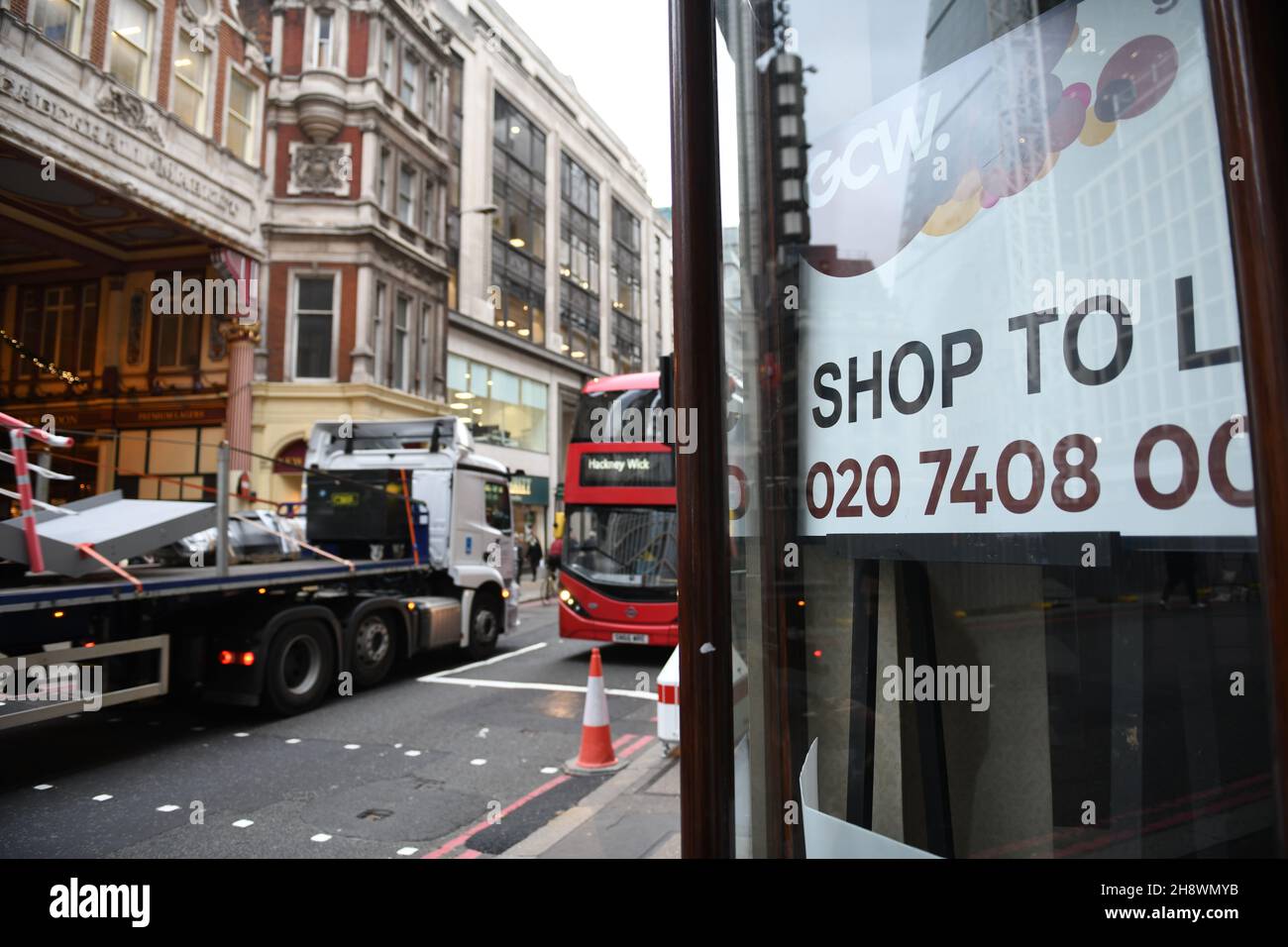 A shop to let sign is seen advertised in the window of an empty shop in ...