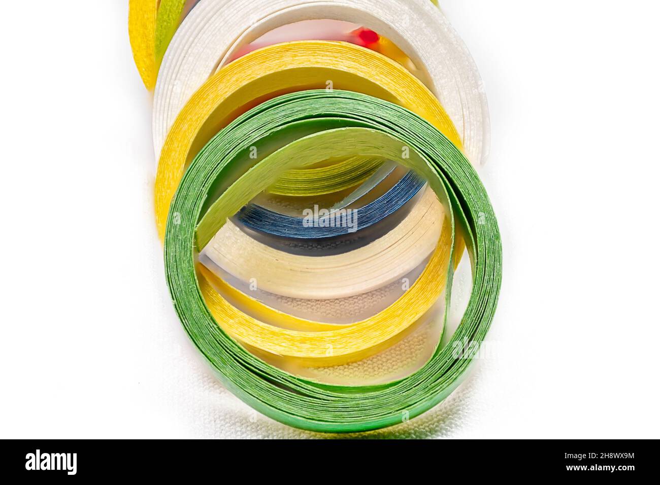 Multi-colored ribbons on a white background Stock Photo - Alamy