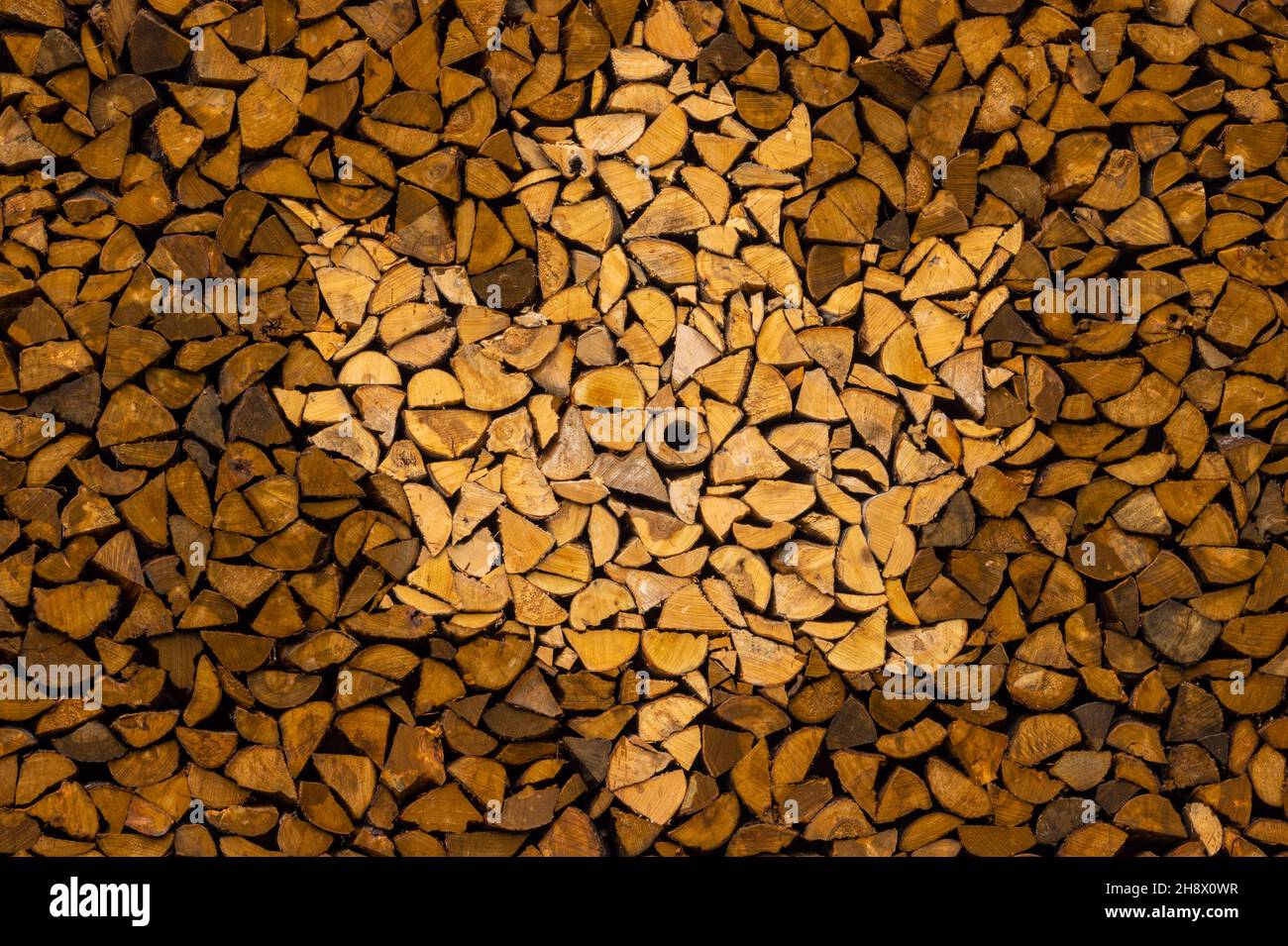 Maple leaf design in a woodpile at Wyckoff Family Maple sugar center, Jeffersonville, Vermont, USA Stock Photo