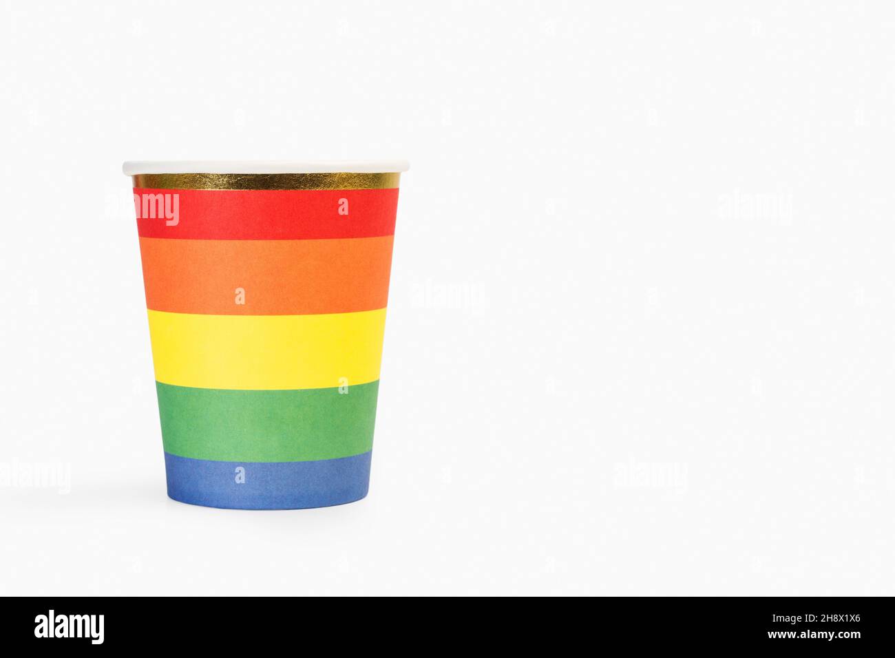 Multicolored paper cup on a white background Stock Photo
