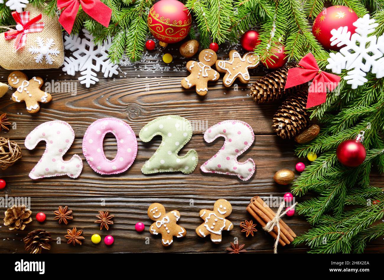 Christmas In Woods 2022 Colorful Stitched Digits 2022 Of Polkadot Fabric With Christmas Decorations  Flat Lay On Wooden Background Stock Photo - Alamy