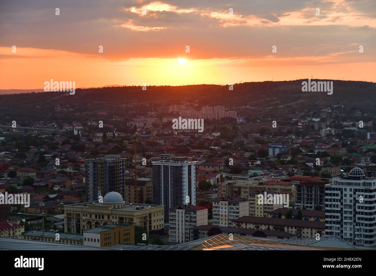 Grozny, Chechen, Russia - September 13, 2021: View from the observation deck of the Grozny city at sunset Stock Photo