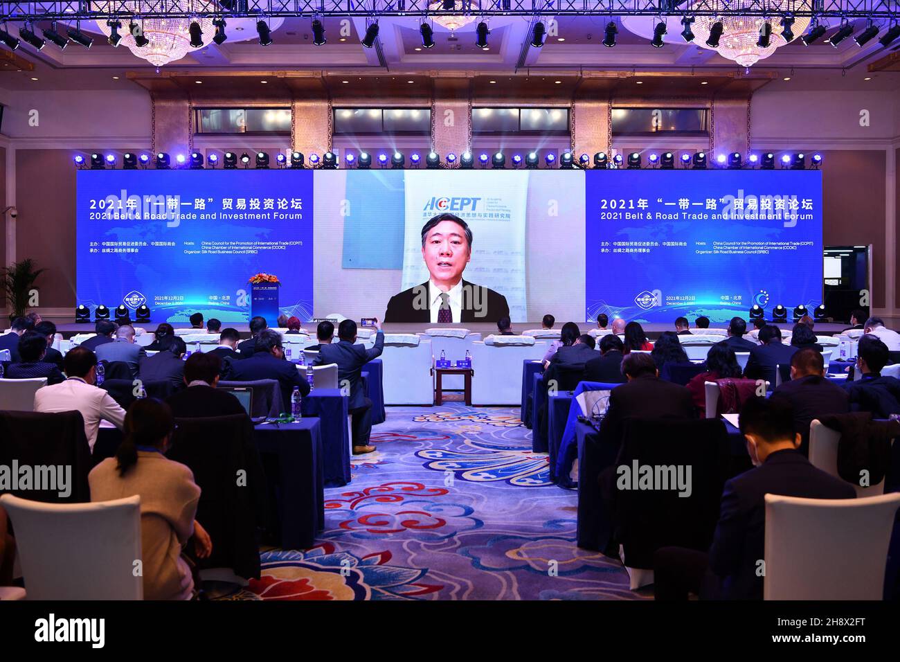 Beijing, China. 2nd Dec, 2021. Li Daokui, Director of the Academic Center for Chinese Economic Practice and Thinking (ACCEPT) at Tsinghua University addresses the 2021 Belt & Road Trade and Investment Forum via video link in Beijing, capital of China, Dec. 2, 2021. Credit: Li Xin/Xinhua/Alamy Live News Stock Photo