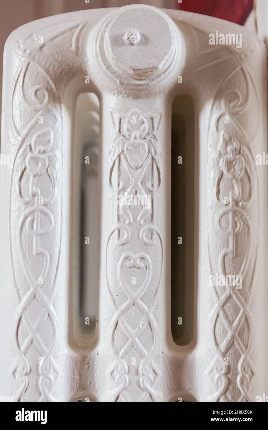 End detailing on a cast iron radiator located in a French Chateau in La ...