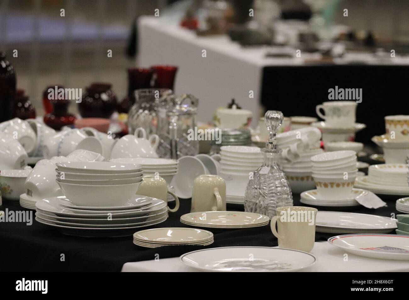 Types of dishware on the table in the flea market Stock Photo Alamy