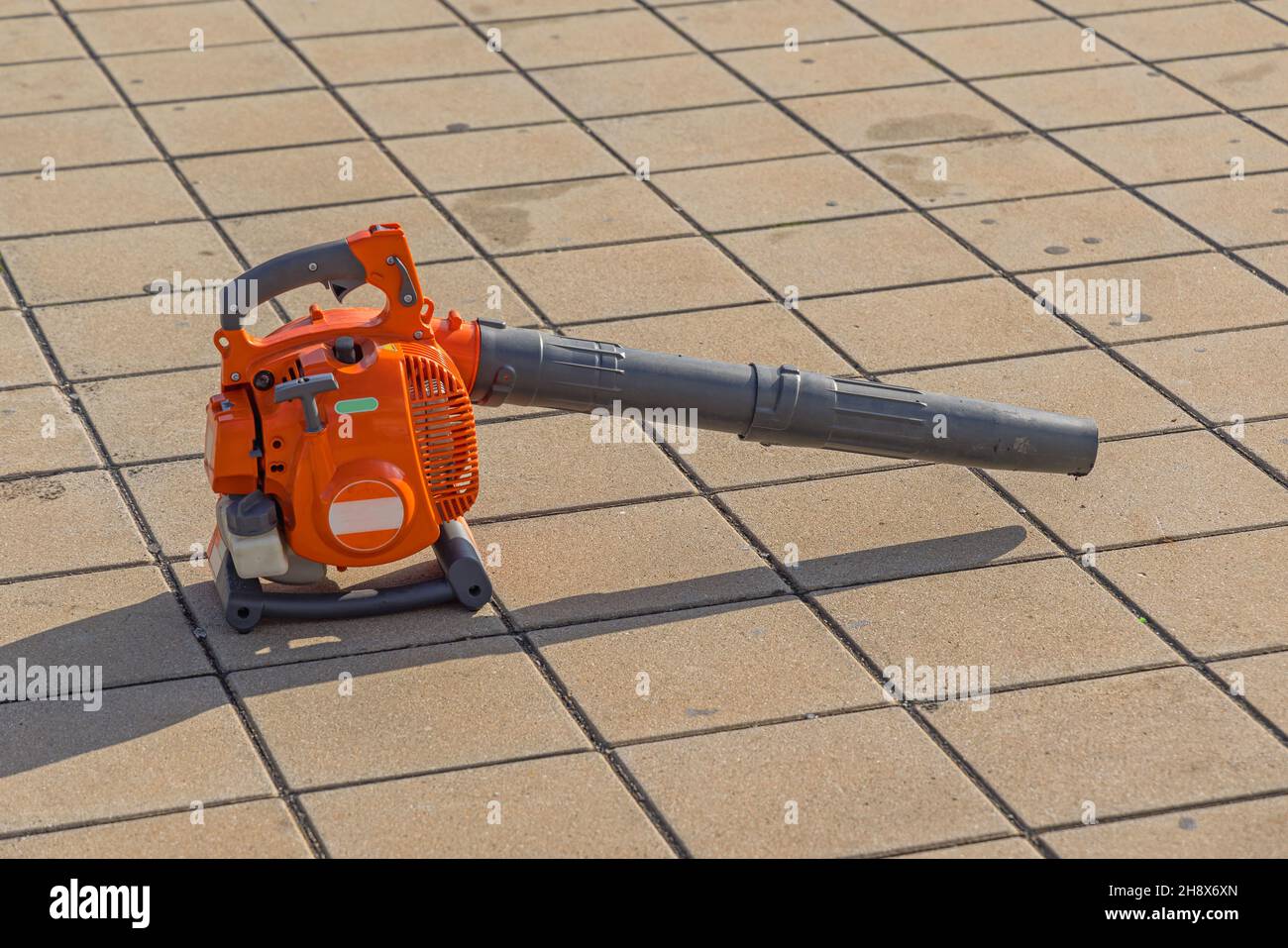 Gas Powered Leaf Blower at Clean Tiled Pavement Stock Photo Alamy