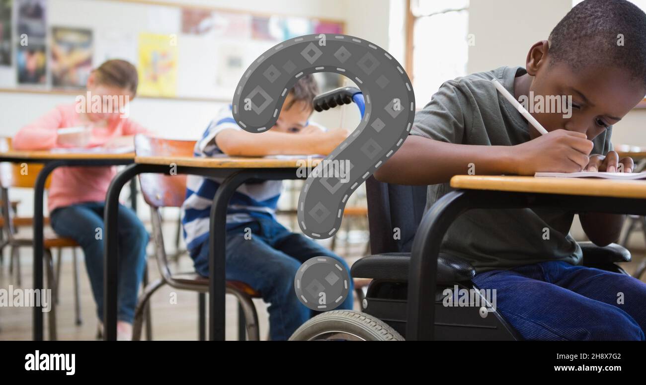 Digital composite of gray question mark over students writing at desk in classroom Stock Photo