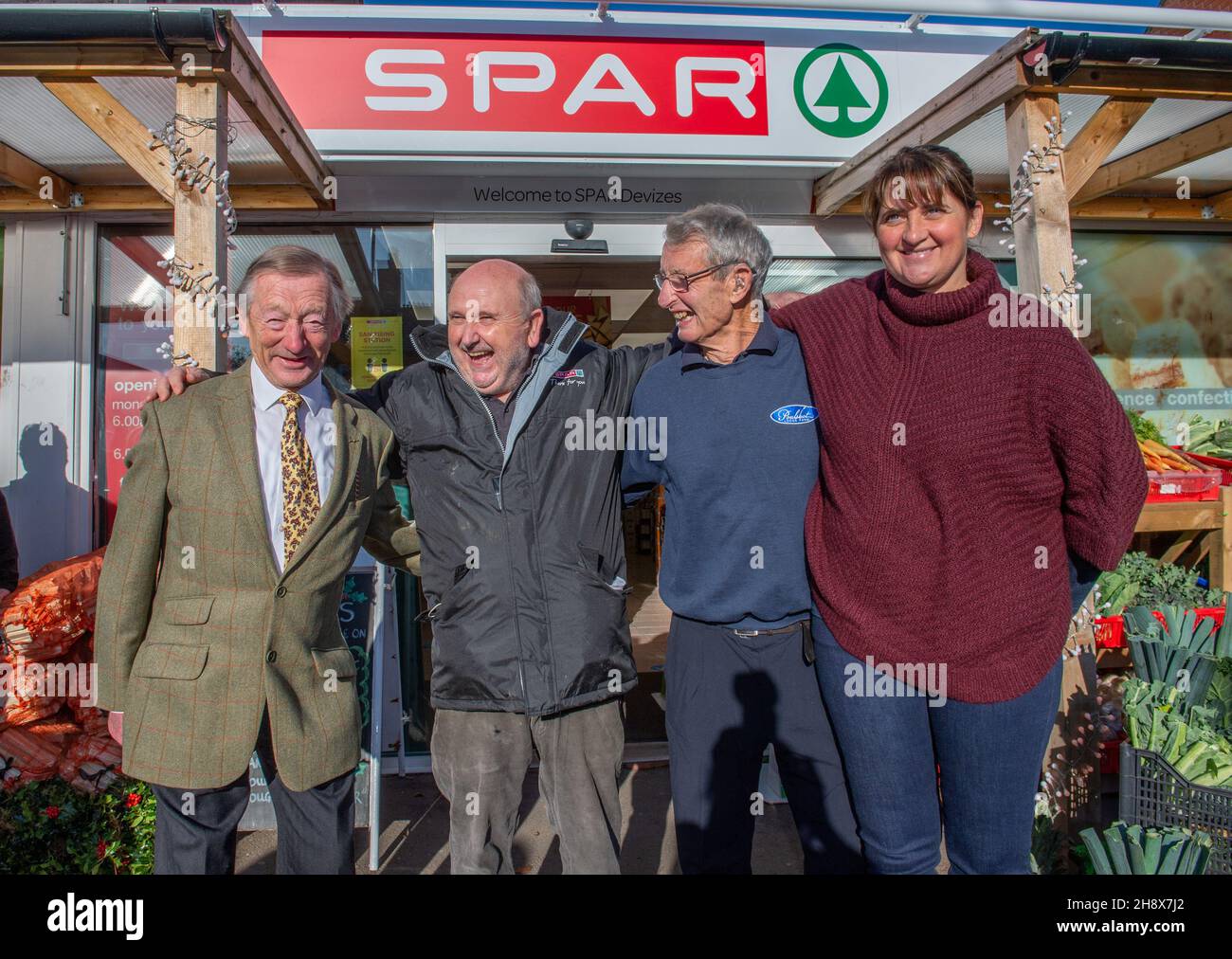 (left to right) Stewart Plank, a milk distributor, Spar shop owner Derek Tinnion, Michael Hues, a local farmer and meat supplier and Hannah Paget, local farmer and vegetable supplier, during a visit by the Duchess of Cornwall to Mr Tinnion at his store in Devizes, Wilsthire, to thank him and his family and staff for their tireless work in supporting the Devizes community for over 60 years, especially during the pandemic. Picture date: Thursday December 2, 2021. Stock Photo