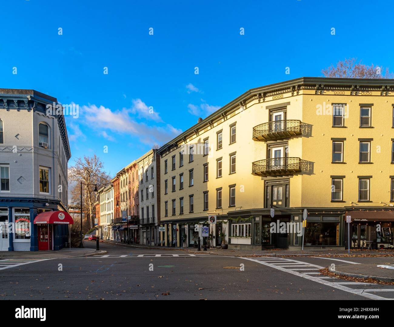 Kingston, NY USA Nov. 27, 2021 Horizontal sunrise view of the shops and cafes of West Strand