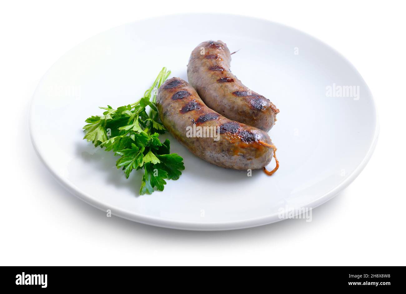Grilled homemade liver sausage on white plate Stock Photo Alamy