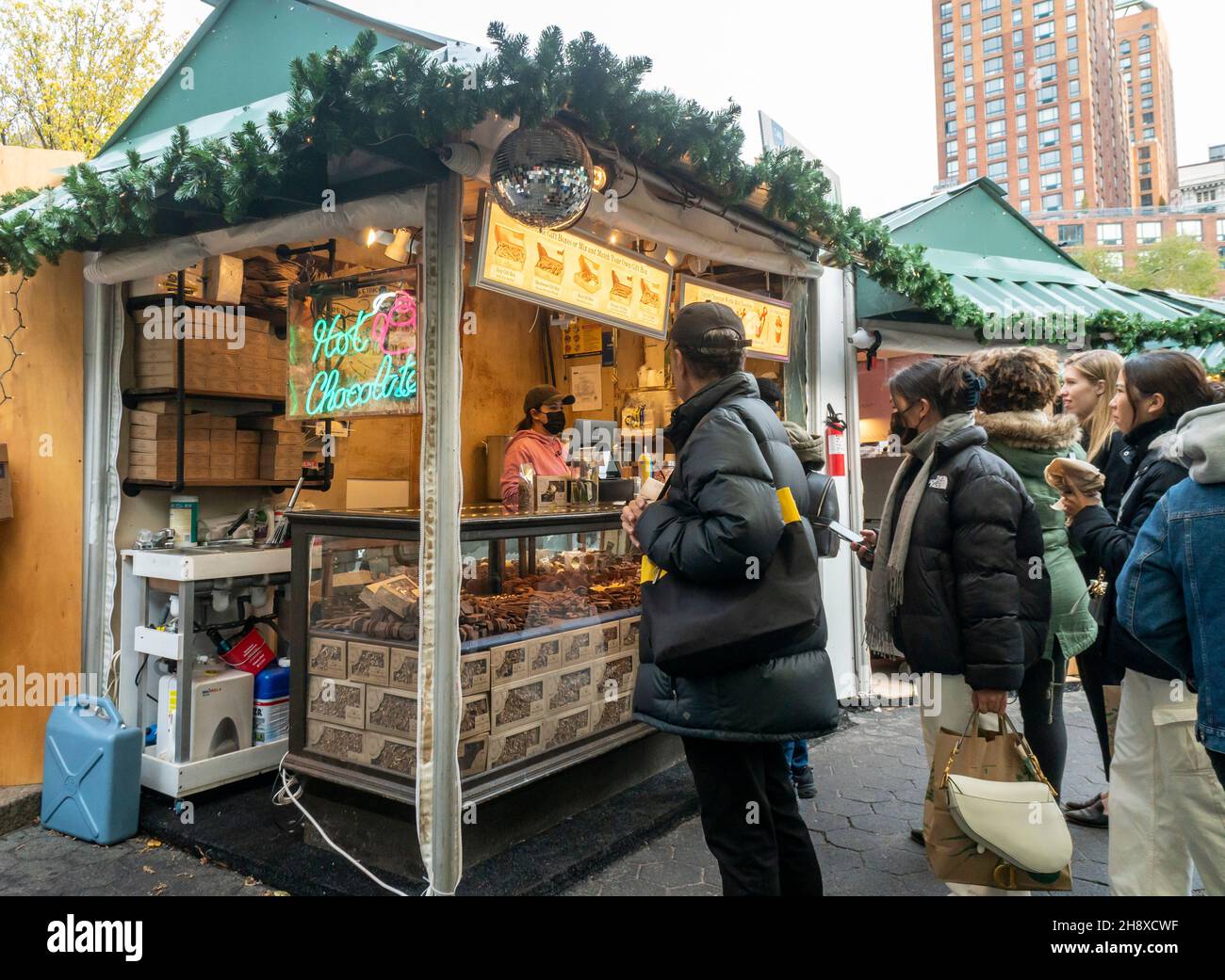 Back from its one-year pandemic hiatus shoppers browse at the Union Square Holiday Market in New York on Wednesday, December 1, 2021.  (© Richard B. Levine) Stock Photo