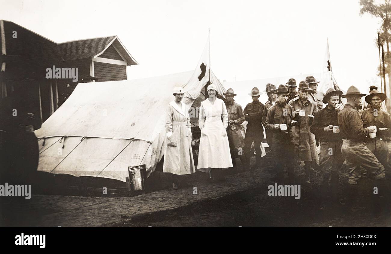 Two American Red Cross Canteen Workers with U.S. Soldiers of 57th Infantry of 3rd Division from