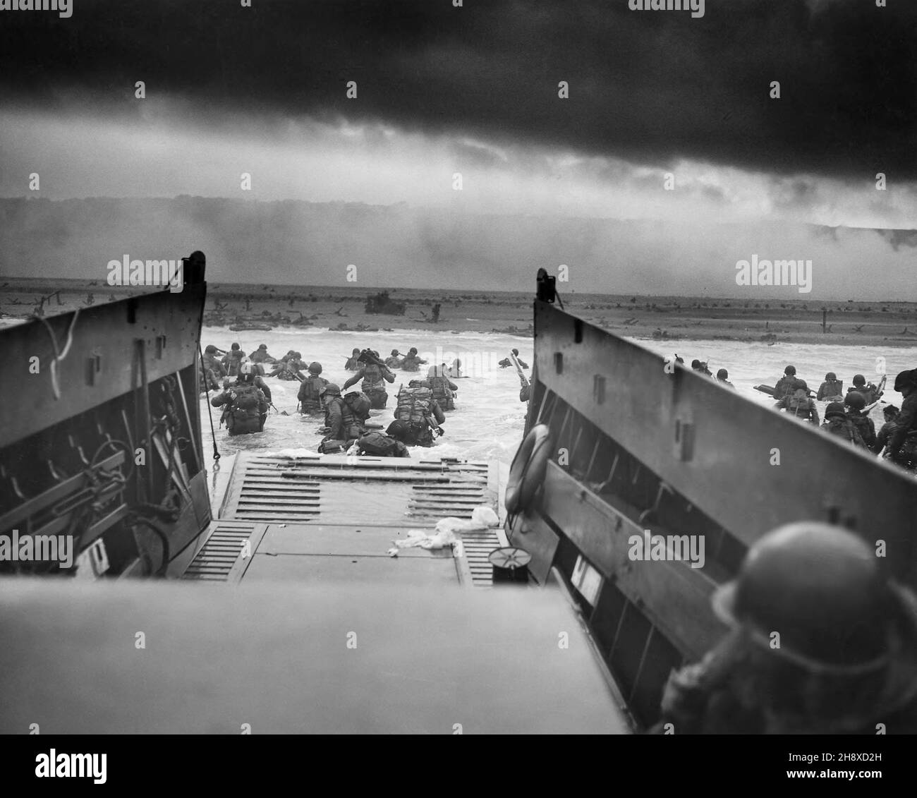 American Soldiers wading into Water after landing in Normandy, France, Franklin D. Roosevelt Library, U.S. National Archives and Records Administration, June 6, 1944 Stock Photo